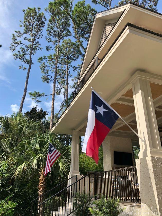 American and Texas flags on porch in Hilton Head