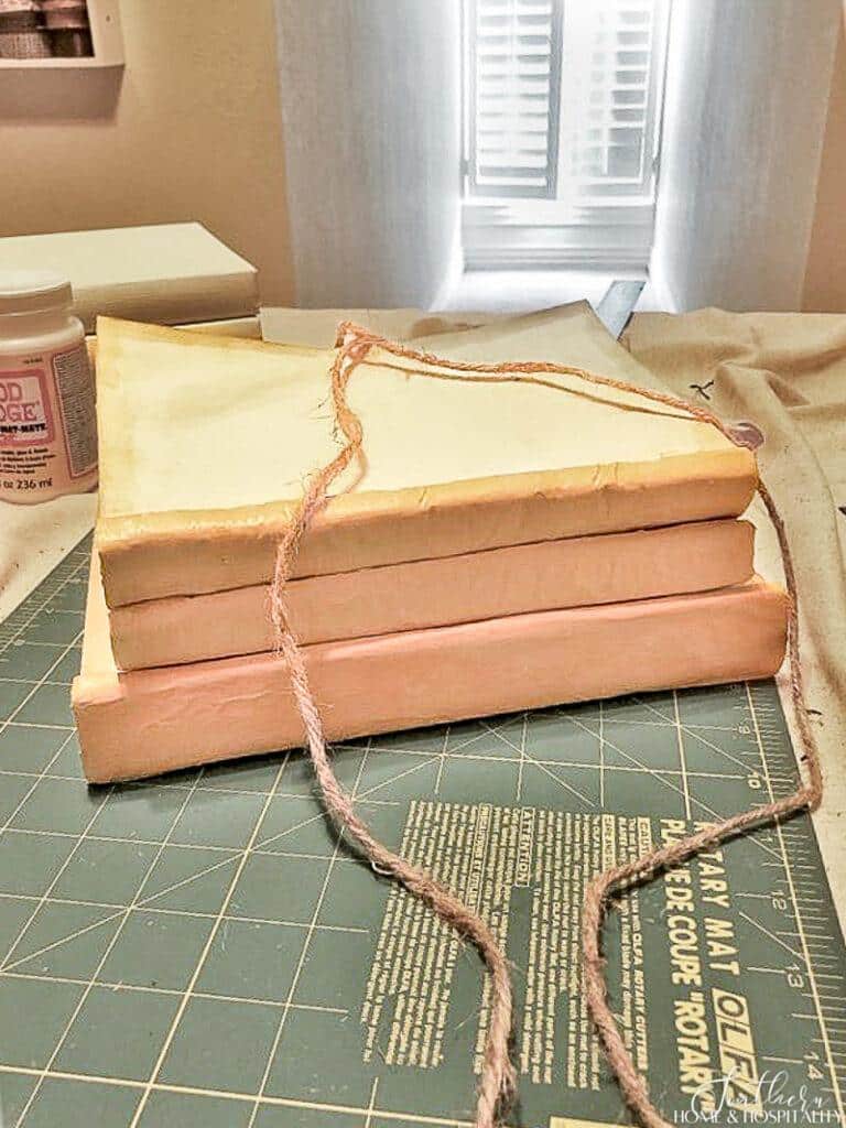 Vintage book stack with jute twine