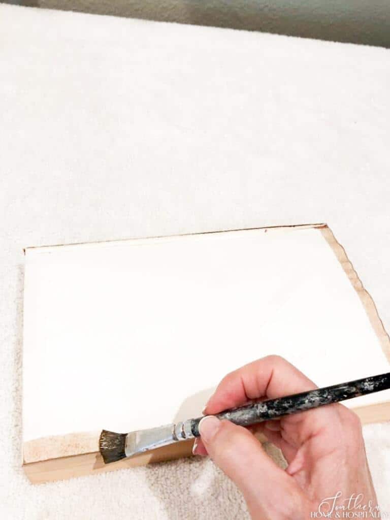 Painting the edges of book pages to age