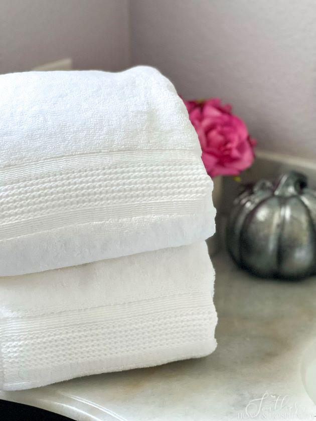 White towels in guest bathroom