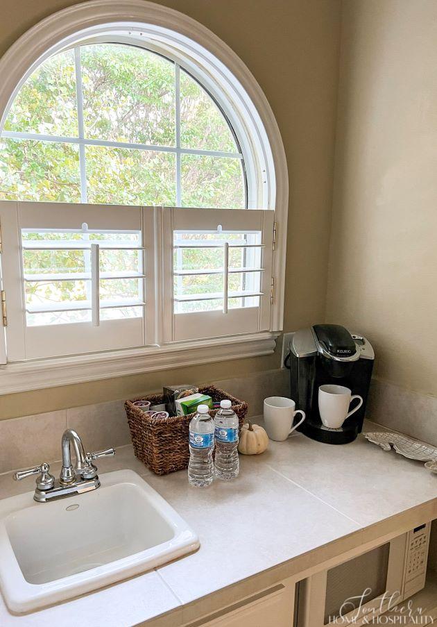 kitchenette with coffee maker for guests