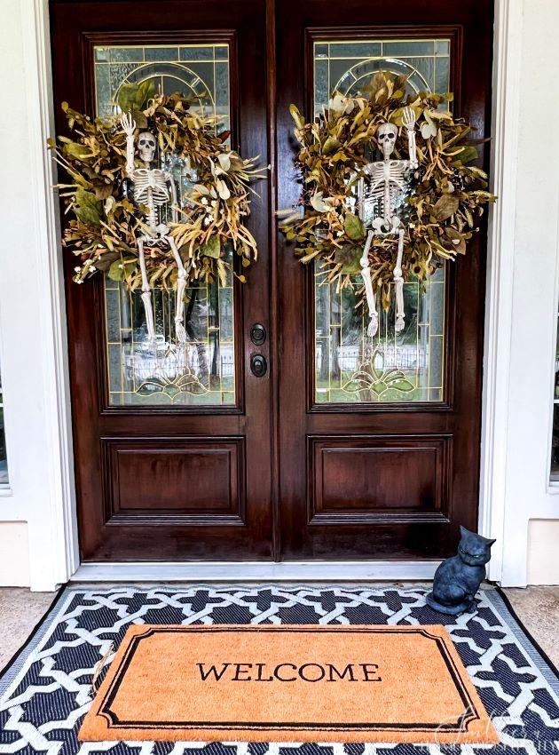 Fall front door wreaths with skeletons