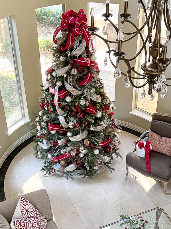 Christmas tree with red bow topper