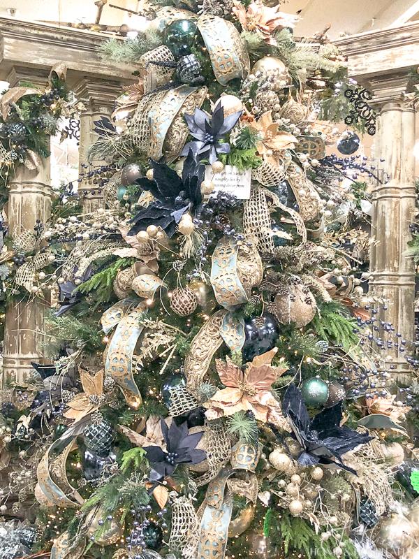 Cascading ribbon on christmas shop tree