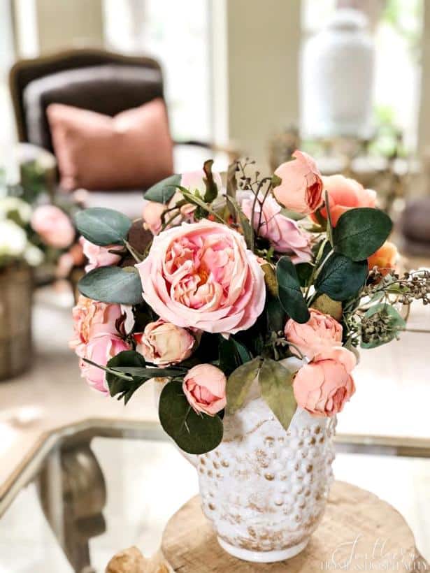 pink roses in vintage white pitcher