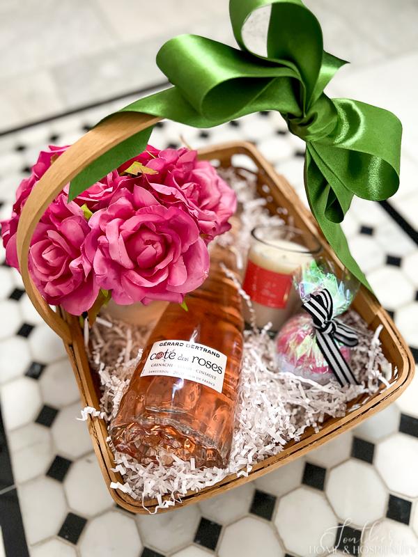 rose wine in basket roses bath bomb candle