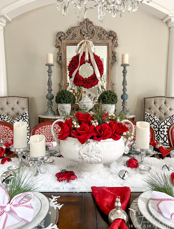 red roses in white bowl, red and white dining table tablescape
