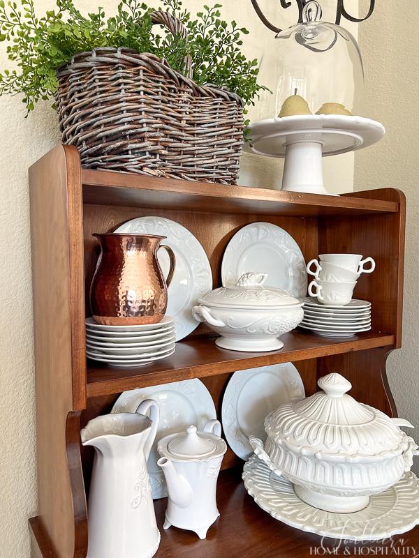 Decorating a hutch with white dishes