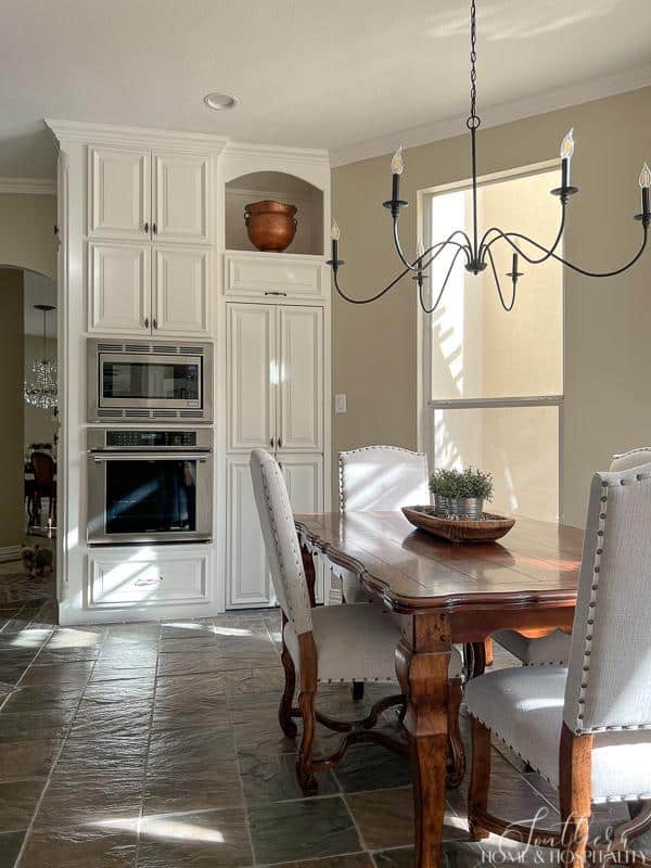 Floor to ceiling cabinet with alcove, large iron kitchen chandelier