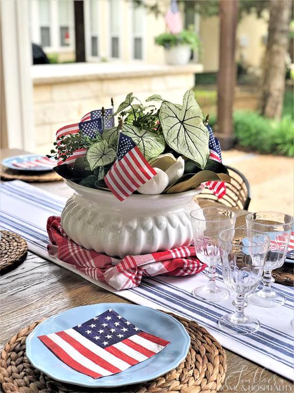 Outdoor dining table decorated for July 4
