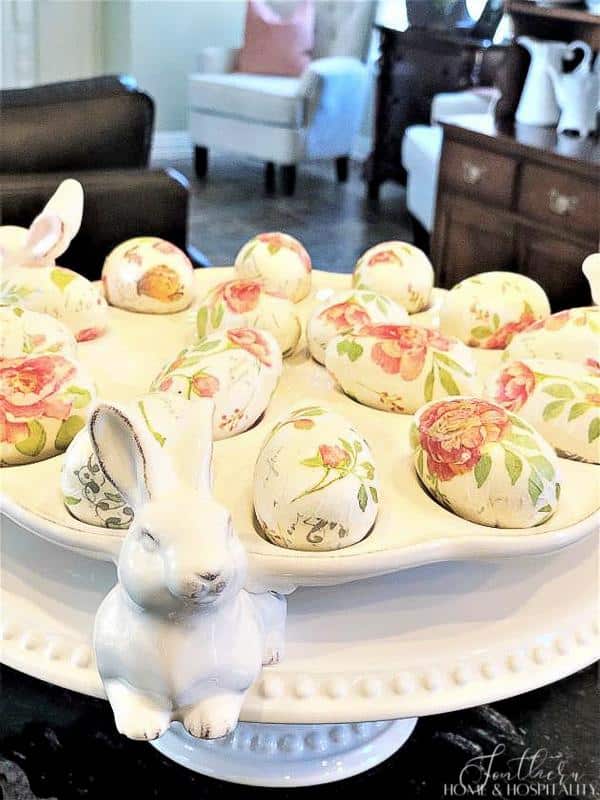 Easter decoration with decoupage eggs in a bunny egg plate