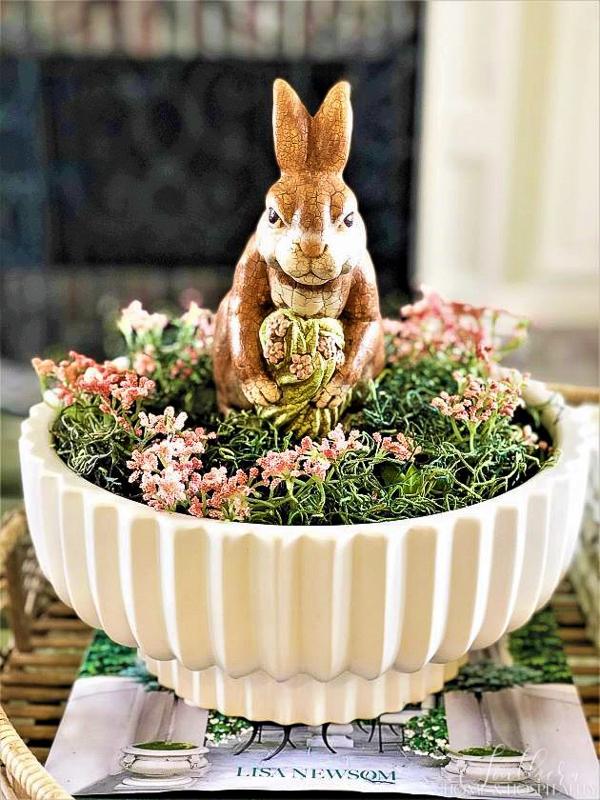 Spring decor with bunny in a bowl with flowers