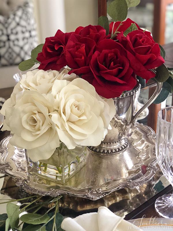 Red and white roses on a silver tray