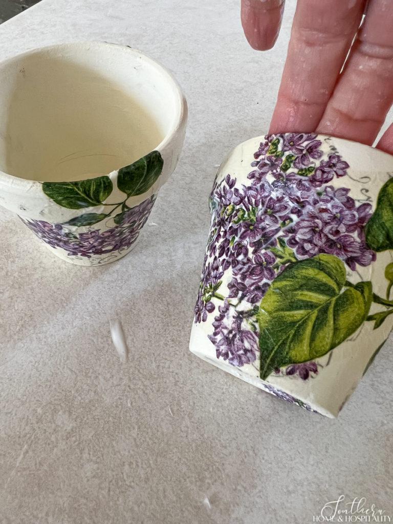 Flower pot with wet Mod Podge over floral napkin