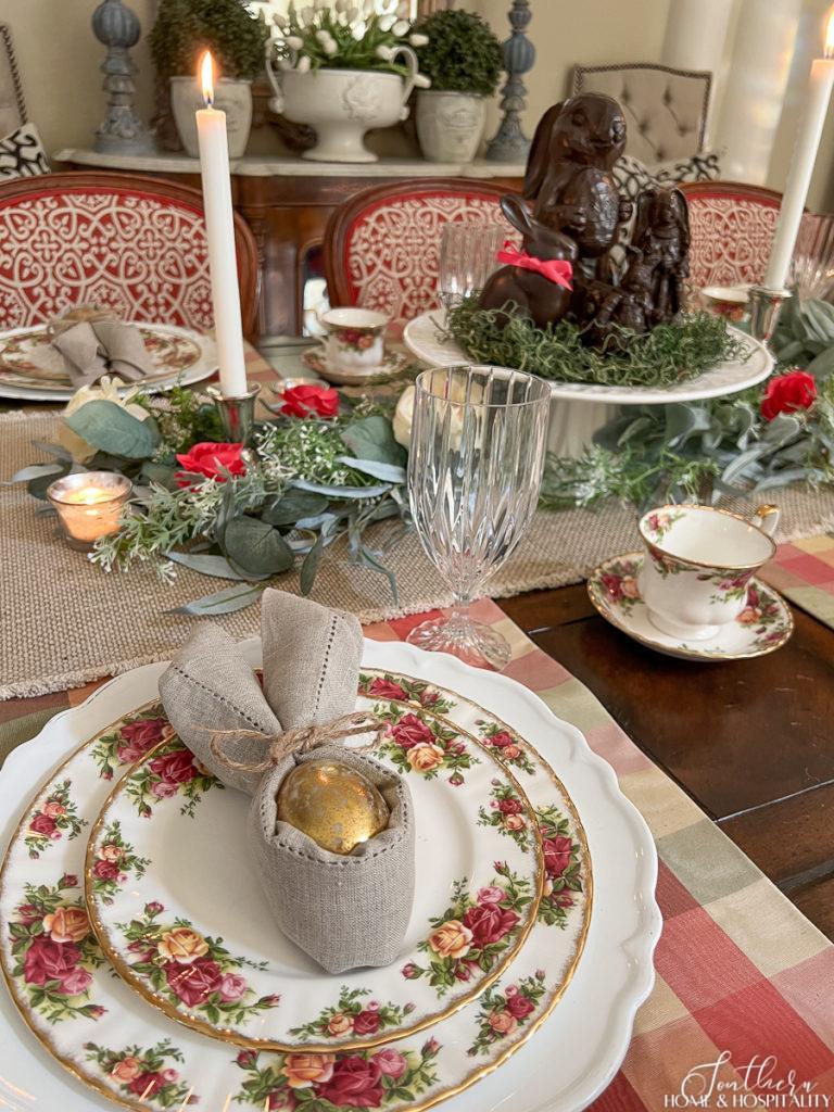 Old Country Rose China in an Easter tablescape with bunny napkin fold and faux chocolate bunnies