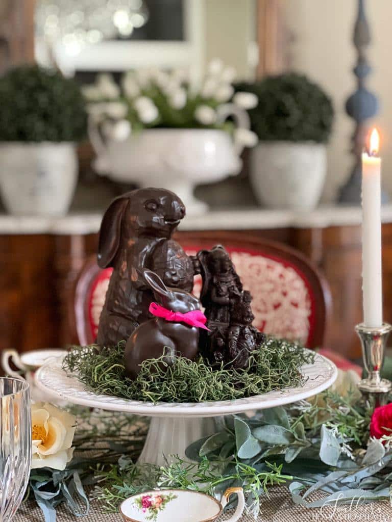Faux chocolate Easter bunnies in a dining table centerpiece