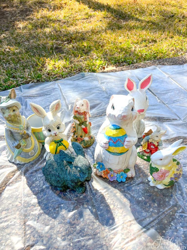 Easter rabbit figurines before chocolate brown paint