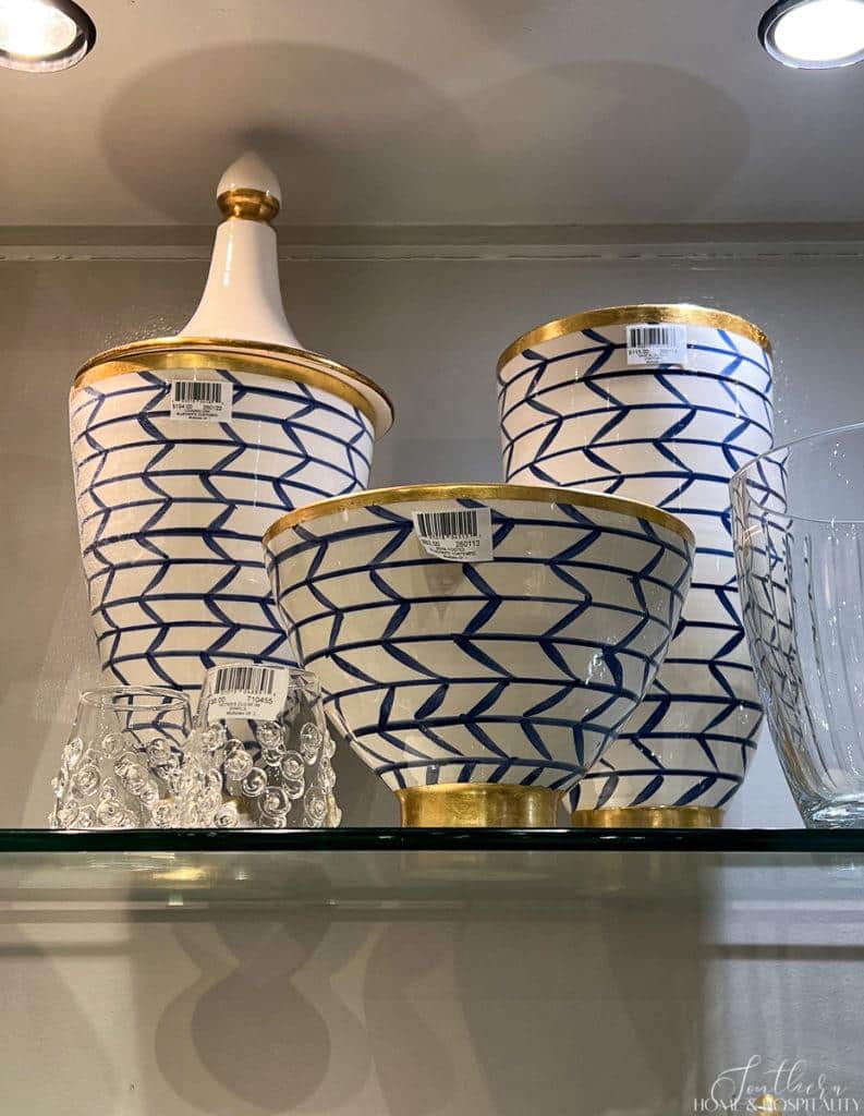 Blue, white, and gold pottery vase, urn, and bowl