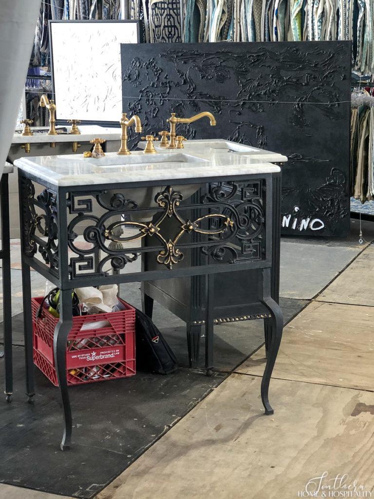 Sink vanity with iron scrollwork