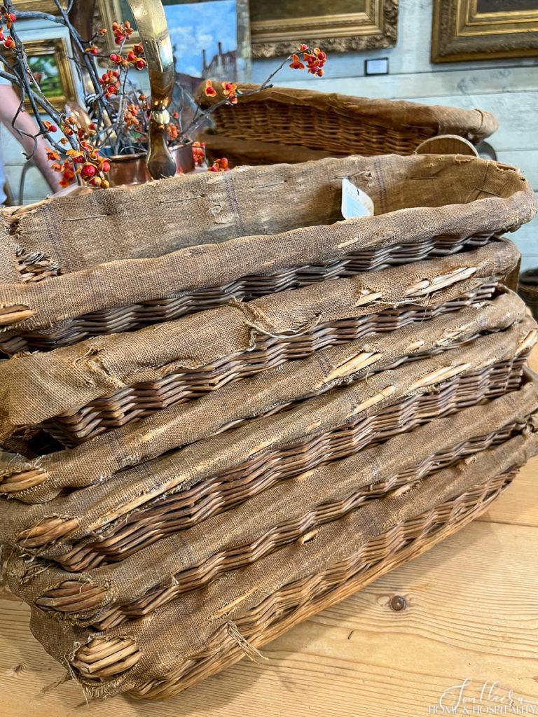 Stack of vintage French baskets