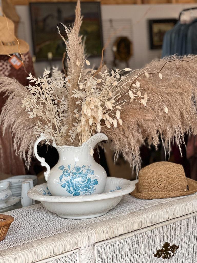 Pampas grass and wheat in an antique blue and white pitcher