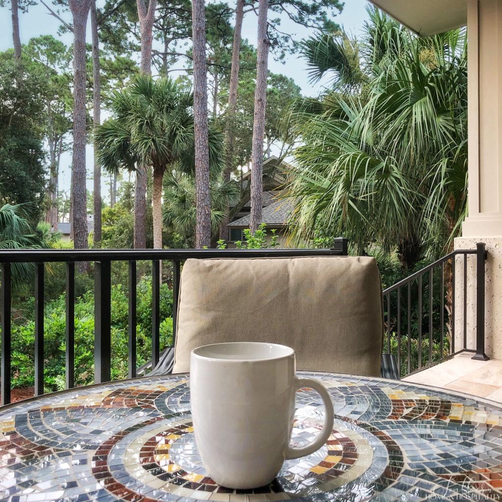 Cup of coffee on the porch at the beach