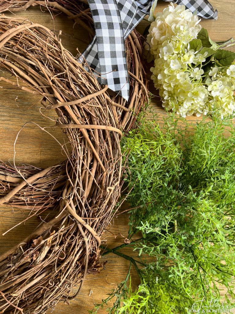 grapevine wreaths, fern picks, and hydrangea supplies for summer wreath