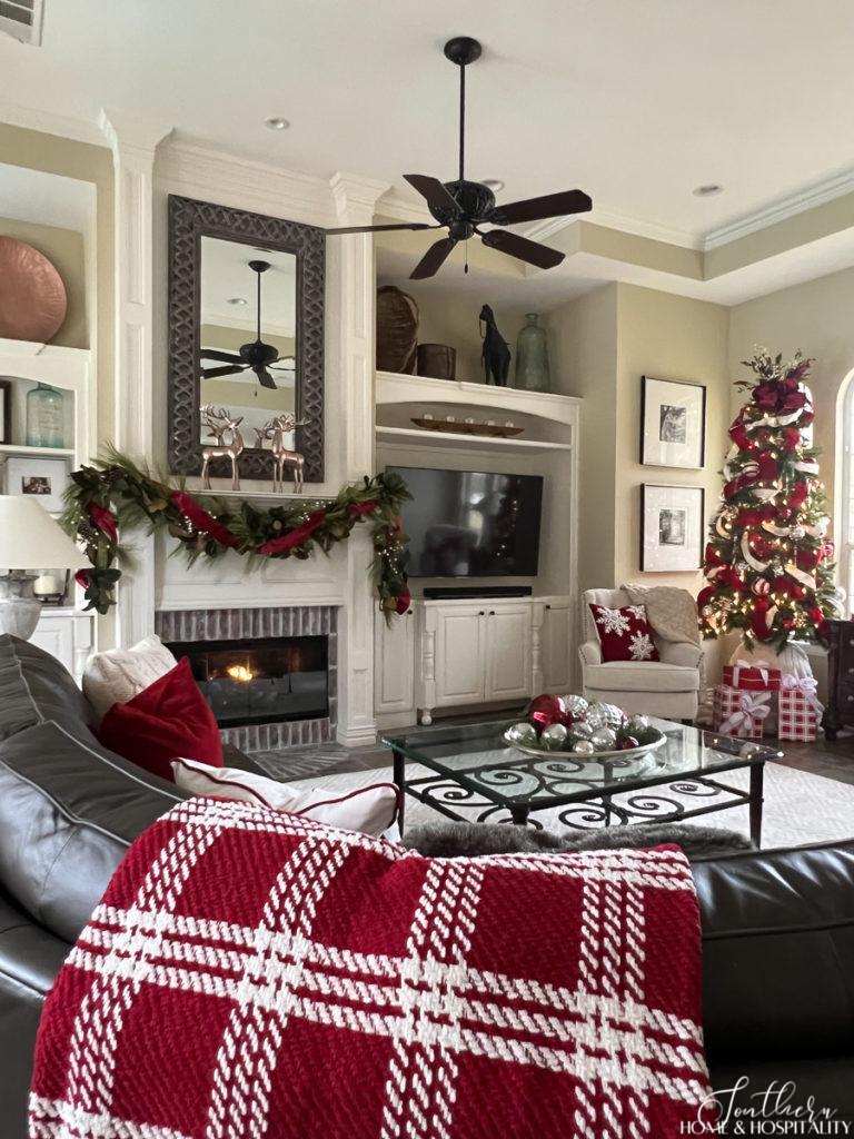 Neutral living room with pops of red for Christmas