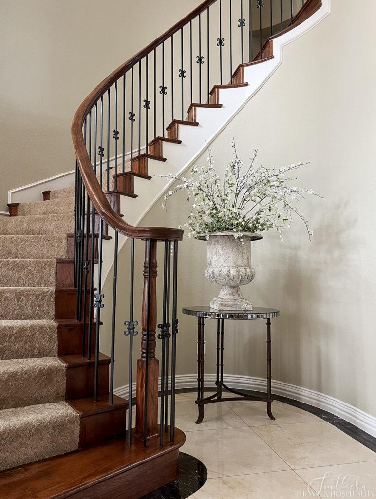 Curved staircae with iron balusters