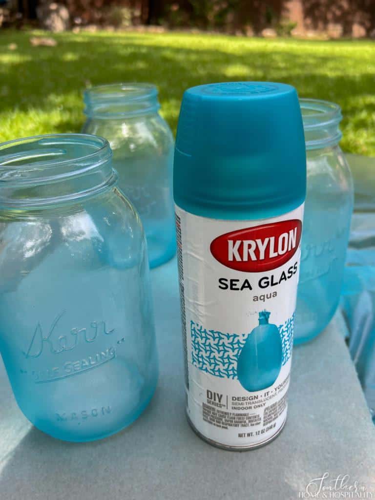 Krylon Sea Glass spray paint in aqua and jar sprayed with it