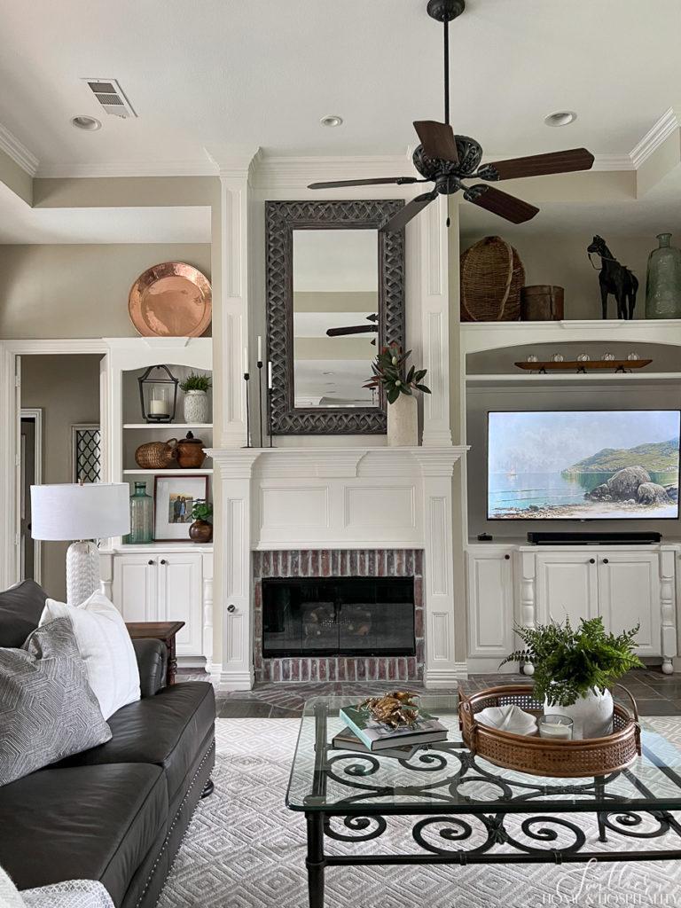 Family room built ins remodeled with wood painted mantel