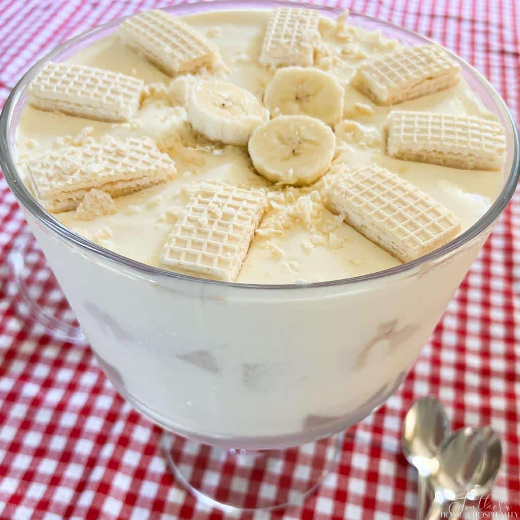 Low sugar banana pudding in a glass trifle dish