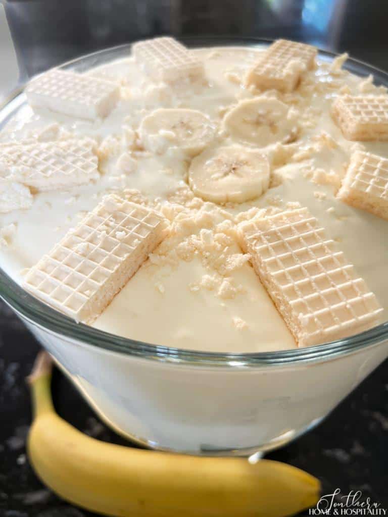 banana pudding topped with cookies and banana slices