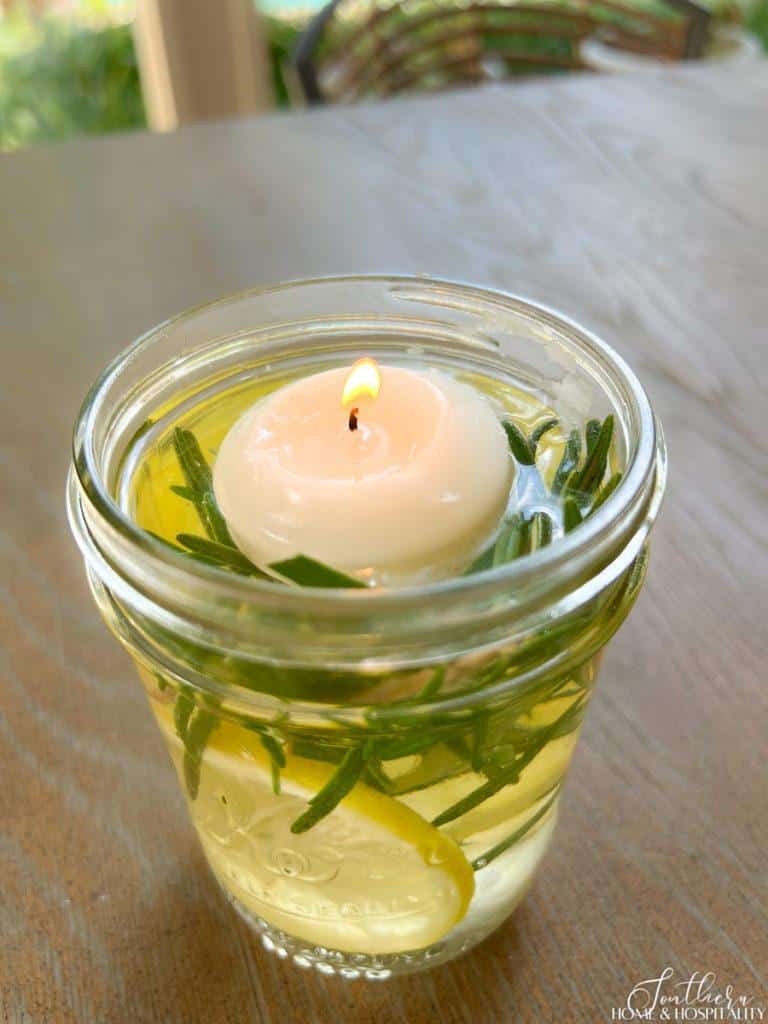 natural bug repellent mason jar candle with lemons and rosemary