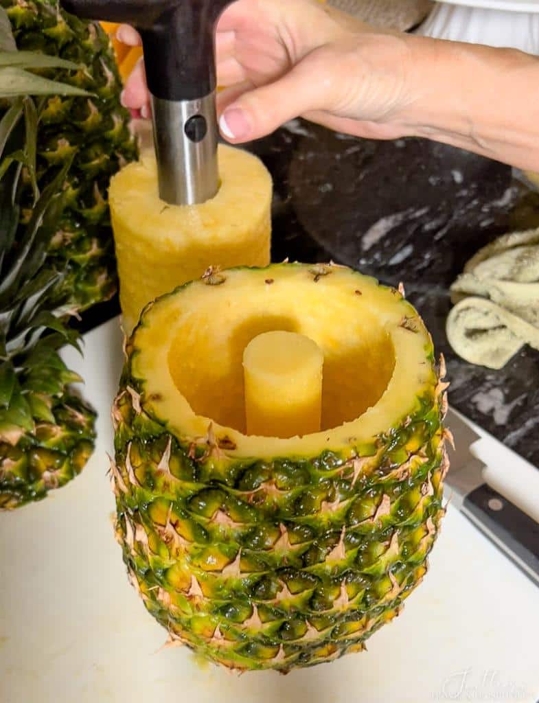 Pineapple slices removed with corer leaving core