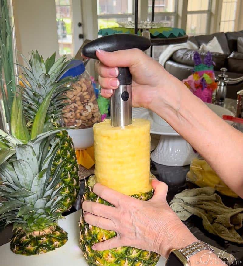 Removing pineapple slices from a pineapple