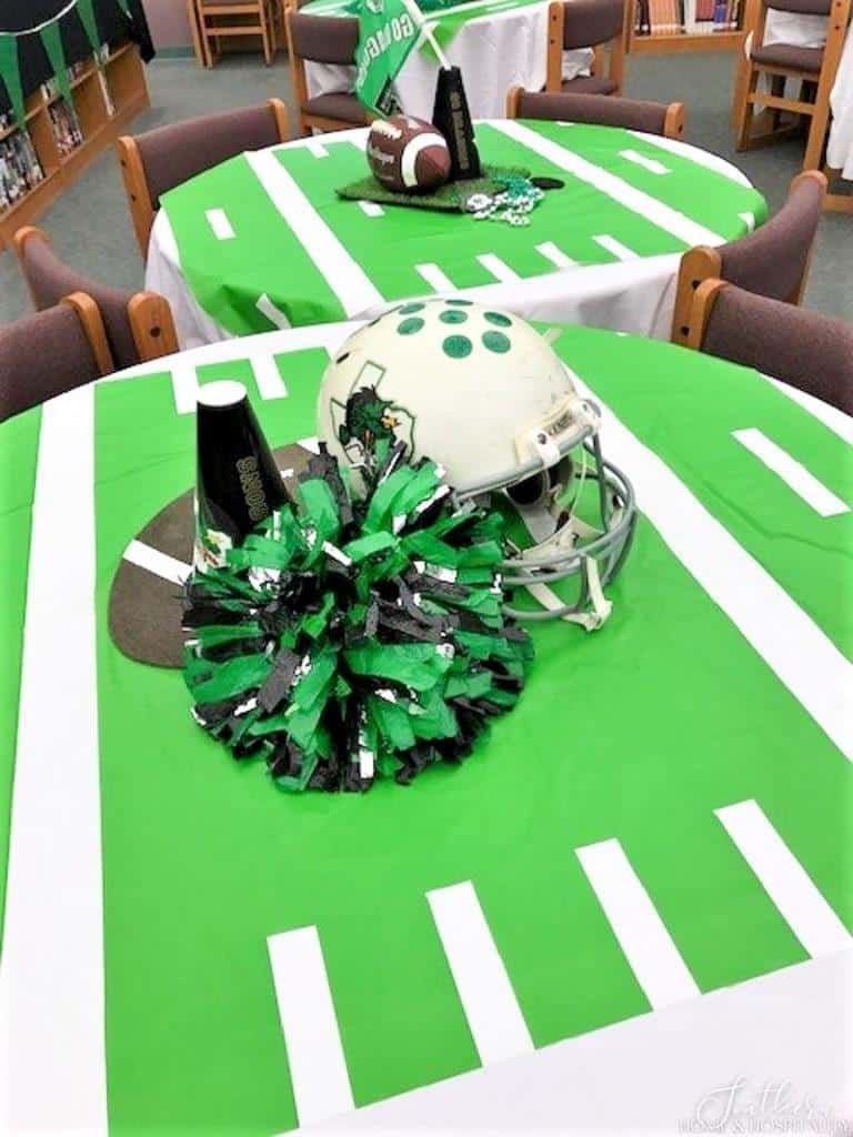 football party centerpiece with helmet and pompom
