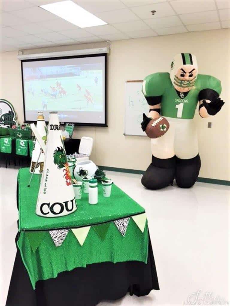 green fabric over party table for football theme