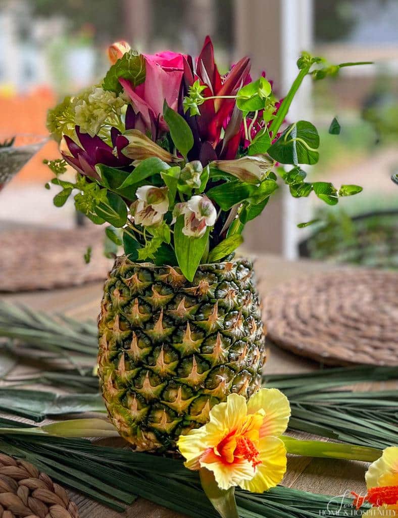 Pineapple vase flower arrangement