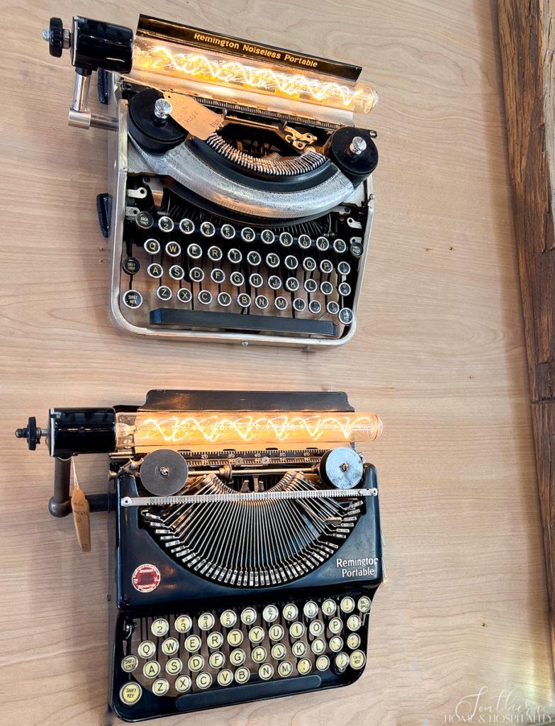 old typewriters on a wall