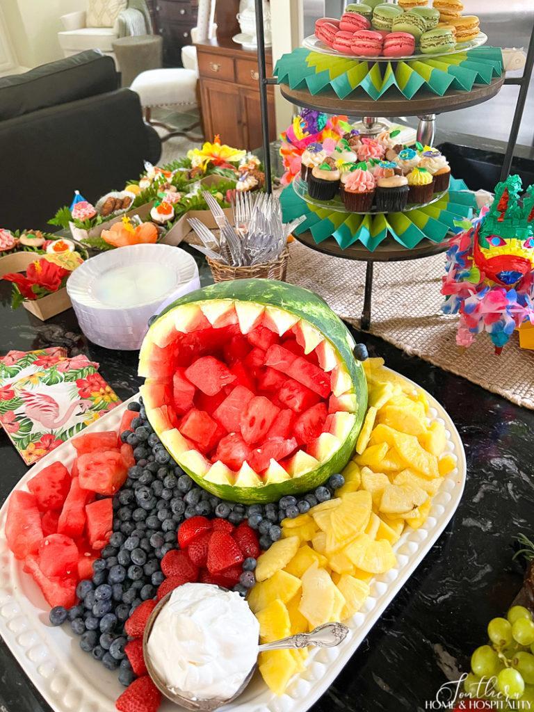 watermelon shark filled with watermelon on party buffet