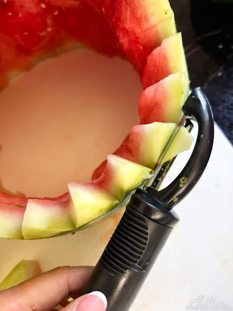 peeling watermelon shark teeth with vegetable peeler