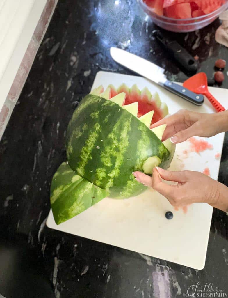 attaching eyes to watermelon shark