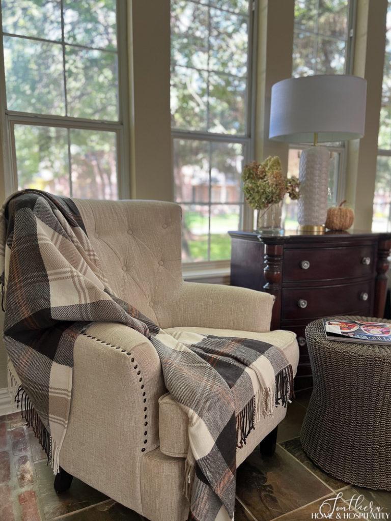 flannel throw draped over chair 