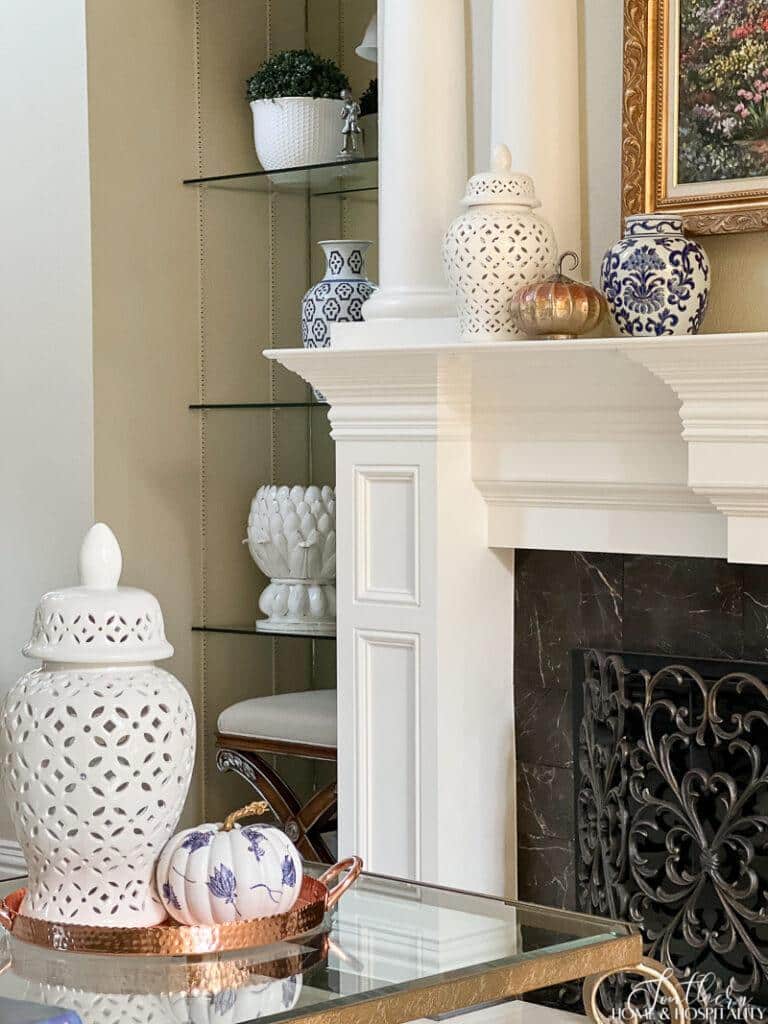 Blue and white fall decor with pumpkins, copper, and cozy textures for seasonal decorating.