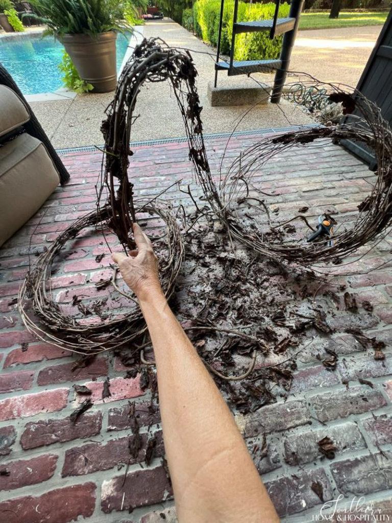 pulling apart grapevine wreath