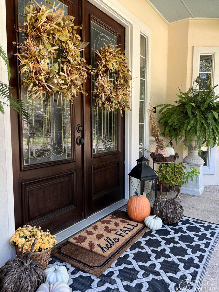 Front porch decorated for fall 