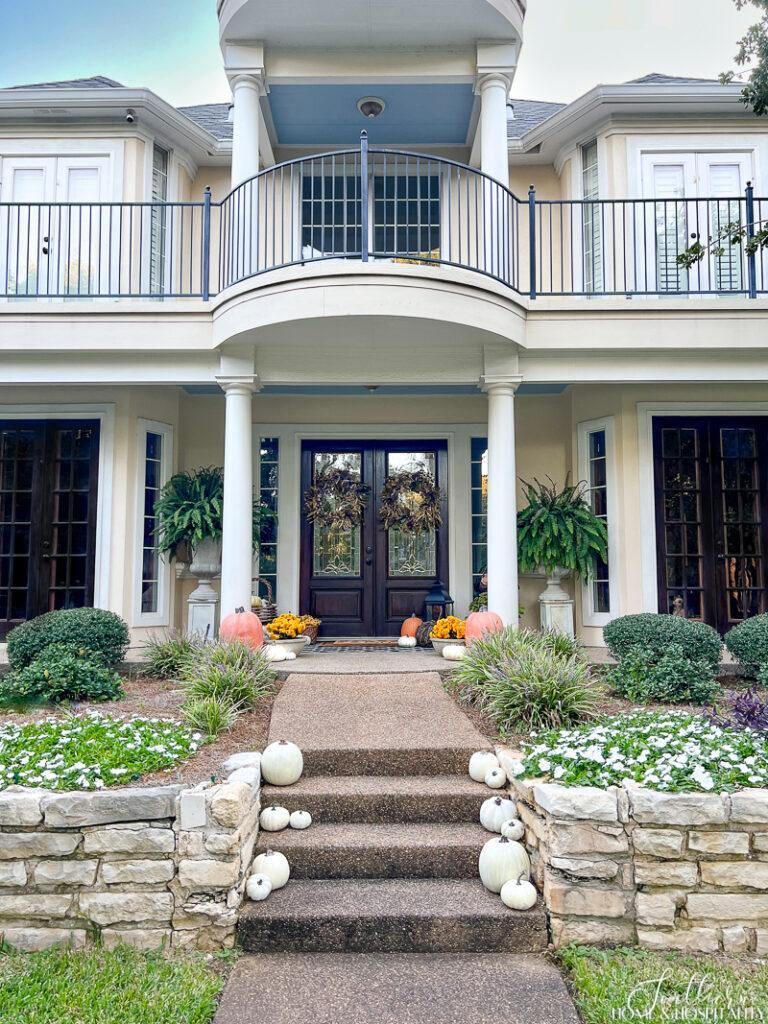 Front porch steps with pumpkins