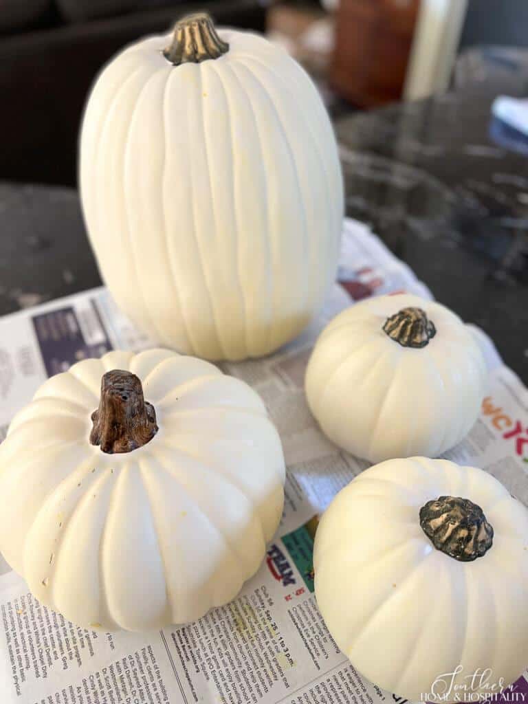 White faux pumpkins