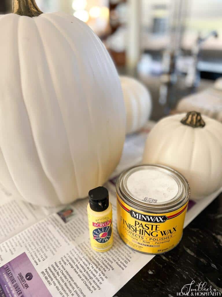 Furniture wax and yellow paint for faux pumpkin DIY